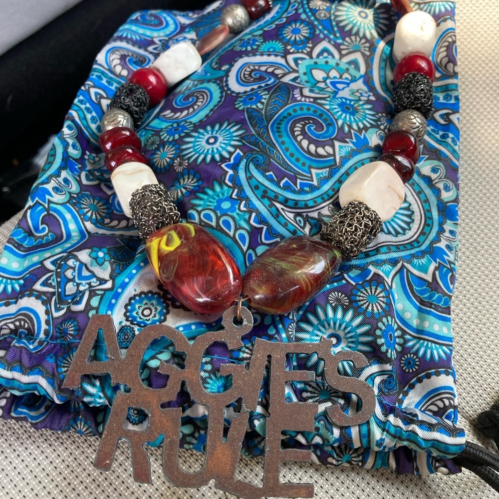 Red and White Beaded Bracelet with Metal Charm